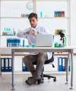 Man student working in chemical lab on experiment Royalty Free Stock Photo