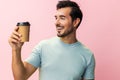 Man studio coffee drink t-shirt hot energy tea paper happy mug copy space hipster cup Royalty Free Stock Photo