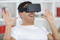 man in studio wearing virtual reality headset playing game Royalty Free Stock Photo