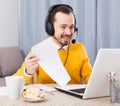 Man studying remotely at home Royalty Free Stock Photo