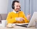 Man studying remotely at home Royalty Free Stock Photo