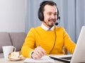 Man studying remotely at home Royalty Free Stock Photo