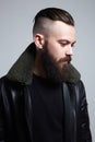 Man with stylish haircut. handsome Boy with beard Royalty Free Stock Photo