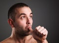 Man sucking his thumb Royalty Free Stock Photo