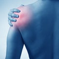 Man suffering from acute pain in shoulder