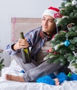 Man suffering hangover after christmas party Royalty Free Stock Photo