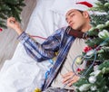 Man suffering hangover after christmas party Royalty Free Stock Photo