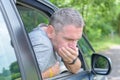 Man suffering from motion sickness Royalty Free Stock Photo