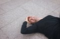 Man suffering from pain have a headache injury and fall down on the floor after running workout Royalty Free Stock Photo