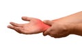 A man suffering from pain in his wrist, red spot, isolated. Healthcare concept. Causes of pain include sprains in wrist