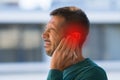 Man suffering from of strong earache or ear pain. Otitis