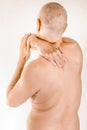 Man suffering of thoracic vertebrae or trapezius muscle pain Royalty Free Stock Photo