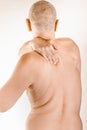 Man suffering of thoracic vertebrae or trapezius muscle pain Royalty Free Stock Photo