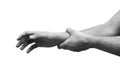 Man suffering from wrist pain, isolated, black and white photo. Causes of pain include sprains in the wrist.