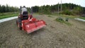 Man suing tractor in the farm 4k