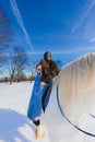 Man in suit of ancient warrior riding big white horse