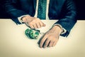 Man in suit chained with handcuffs to money - retro style Royalty Free Stock Photo