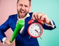 Man suit hold clock in hand and arguing for being late. Business discipline concept. Time management and discipline