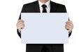 Man in suit holding blank sign board Royalty Free Stock Photo