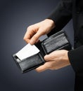 Man in suit holding credit card Royalty Free Stock Photo