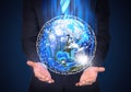 Man in suit holding a earth in hand Royalty Free Stock Photo