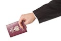 Man in suit holding passport