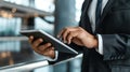 Man in Suit Holding Tablet Royalty Free Stock Photo