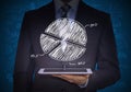 Man in suit holding tablet pc Royalty Free Stock Photo