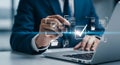 Man in suit interacting with digital interface on laptop screen technology Royalty Free Stock Photo