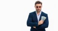 Man in suit with money cash. Dollar banknotes. Portrait of man holding american money banknotes. Dollar bills, credit Royalty Free Stock Photo