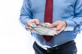 Man in suit offering dollar banknotes close up Royalty Free Stock Photo
