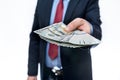 Man in suit offering dollar banknotes close up Royalty Free Stock Photo