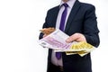 Man in suit offering euro banknotes close up Royalty Free Stock Photo