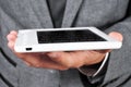 Man in suit reading an ebook Royalty Free Stock Photo