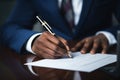 Man Signing Document in Suit Royalty Free Stock Photo