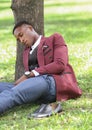 A man in suit sleeping during his lunch break