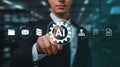 Artificial Intelligence Connecting Concepts A Man Touching an AI Cogwheel Button on a Futuristic Interface Display Royalty Free Stock Photo