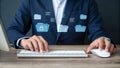 Man in suit typing on keyboard with floating folder icons representing data and file security online Royalty Free Stock Photo