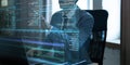 Man in suit using futuristic virtual interface with lines of fictional code and performance analysis.