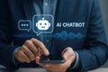 Man in suit using smartphone with AI chatbot interface and sound waves artificial intelligence technology Royalty Free Stock Photo