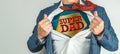 Man in a suit who opens his shirt and tie to become a super hero, super dad. Father`s day concept Royalty Free Stock Photo