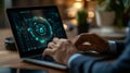 Man in suit working on laptop with futuristic interface on screen in office setting Royalty Free Stock Photo