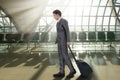 Man with suitcase in terminal airport Royalty Free Stock Photo