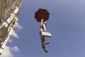 Man with suitcase and umbrella sculpture at mosaic house prague