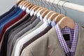 Man suits in a closet Royalty Free Stock Photo