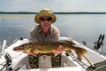 Man with summer pike fish Royalty Free Stock Photo