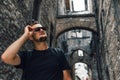 Man in sunglasses outdoor. Narni Terni, Umbria, Italy, medieval city: a typical old street Royalty Free Stock Photo