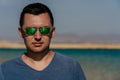Man In Sunglasses Posing At Lake In Desert Of Ras Mohammed National Park