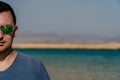 Man In Sunglasses Posing At Lake In Desert Of Ras Mohammed National Park