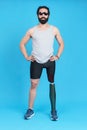 Man with sunglasses standing with a prosthetic leg Royalty Free Stock Photo